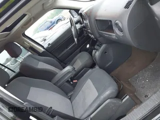2014 Jeep Patriot Latitude with VIN 1C4NJRFB1ED501740, listed as a IAAI auction lot 42722549 with 147,974 mi miles and . Bid and sale history available at DreamBid. Image 5.