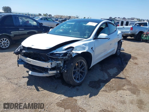 2023 Tesla Model 3 with VIN 5YJ3E1EA2PF571569, listed as a IAAI auction lot 42288715 with 30,271 mi miles and . Bid and sale history available at DreamBid. Image 17.