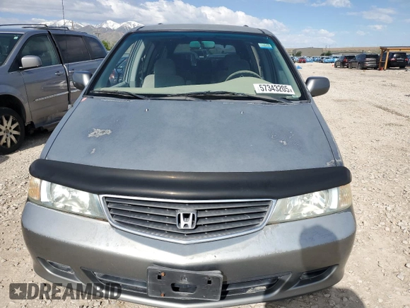 2001 Honda Odyssey EX z VIN 2HKRL18691H571178, wystawiony jako Copart lot #57343205 z przebiegiem 198 506 mil mil oraz Czysty tytuł • Clean title. Historia ofert i sprzedaży dostępna na DreamBid. Obrazek 5.