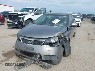2012 Kia Forte EX with VIN KNAFU4A25C5492664, listed as a IAAI auction lot 41889921 with 163,334 mi miles and . Bid and sale history available at DreamBid. Image 17.
