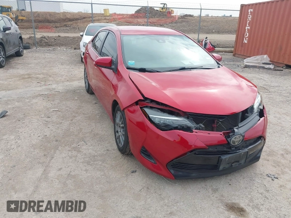 2019 Toyota Corolla L with VIN 5YFBURHEXKP882871, listed as a IAAI auction lot 41747710 with 104,117 mi miles. Bid and sale history available at carsss.com. Image 1.