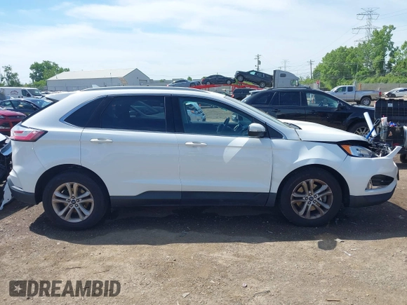 2020 Ford Edge SEL z VIN 2FMPK4J90LBA28960, wystawiony jako IAAI lot #42264189 z przebiegiem 91 312 mil mil oraz . Historia ofert i sprzedaży dostępna na DreamBid. Obrazek 13.
