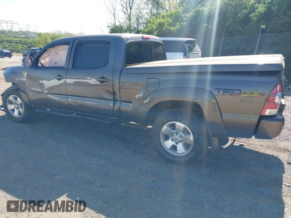 2015 Toyota Tacoma with VIN 3TMMU4FN5FM082376, listed as a IAAI auction lot 42144113 with 98,244 mi miles and . Bid and sale history available at DreamBid. Image 3.