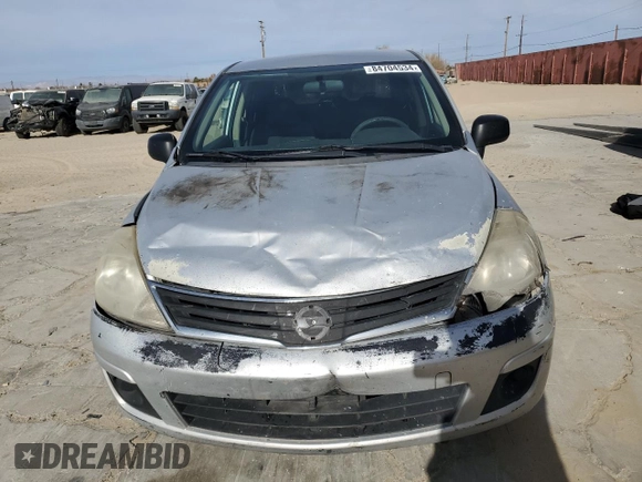 2010 Nissan Versa 1.6 with VIN 3N1CC1AP4AL372566, listed as a Copart auction lot 84704534 with 333,475 mi miles and Salvage Title. Bid and sale history available at carsss.com. Image 5.