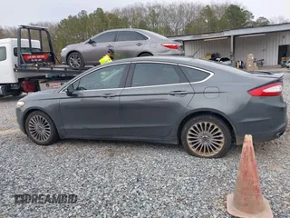2016 Ford Fusion Titanium with VIN 3FA6P0K94GR183257, listed as a IAAI auction lot 41374728 with 67,780 mi miles and . Bid and sale history available at carsss.com. Image 14.
