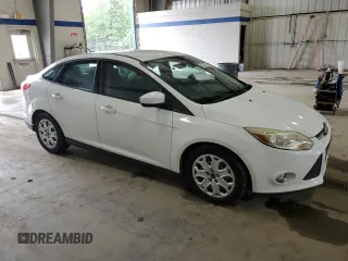 2012 Ford Focus SE with VIN 1FAHP3F20CL451852, listed as a Copart auction lot 60310765 with 150,305 mi miles and Salvage title. Bid and sale history available at DreamBid. Image 4.