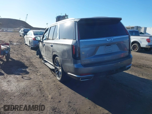 2021 Cadillac Escalade Premium Luxury z VIN 1GYS4CKL2MR231788, wystawiony jako IAAI lot #41630686 z przebiegiem 56 672 mil mil oraz . Historia ofert i sprzedaży dostępna na DreamBid. Obrazek 3.