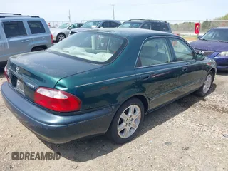 2001 Mazda 626 LX with VIN 1YVGF22D915241384, listed as a IAAI auction lot 41927705 with 231,801 mi miles. Bid and sale history available at carsss.com. Image 4.