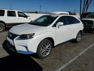 2015 Lexus RX 450h with VIN 2T2ZB1BAXFC003138, listed as a Copart auction lot 84299114 with 105,663 mi miles and Salvage Title. Bid and sale history available at DreamBid. Image 1.