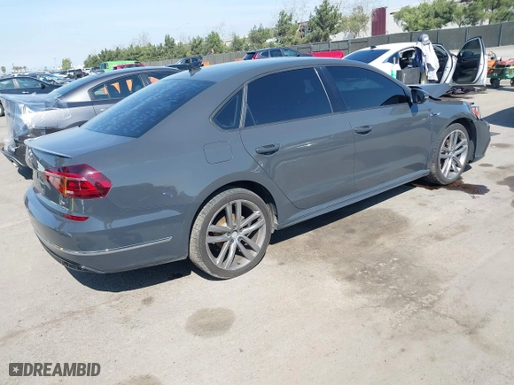 2018 Volkswagen Passat 2.0T S with VIN 1VWAA7A34JC025600, listed as a IAAI auction lot 41594079 with 92,019 mi miles. Bid and sale history available at carsss.com. Image 4.