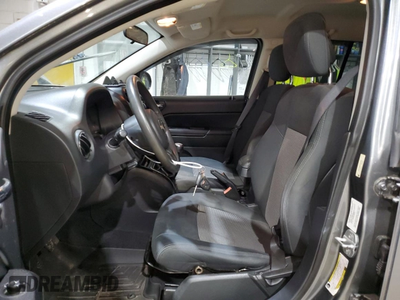 2012 Jeep Compass Sport with VIN 1C4NJCBB4CD579381, listed as a Copart auction lot 87043604 with 87,667 mi miles and Clean Title. Bid and sale history available at carsss.com. Image 7.