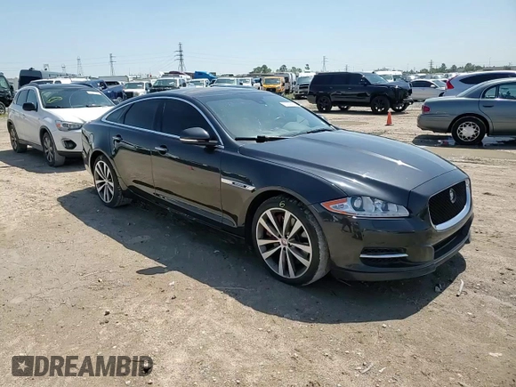 2013 Jaguar XJ with VIN SAJWA3HE9DMV49768, listed as a Copart auction lot 50339955 with 56,841 mi miles and Salvage Title. Bid and sale history available at DreamBid. Image 10.