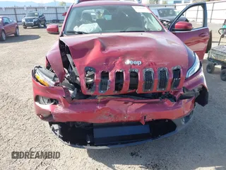 2016 Jeep Cherokee Latitude with VIN 1C4PJMCS8GW250318, listed as a IAAI auction lot 42126241 with 105,028 mi miles. Bid and sale history available at carsss.com. Image 6.