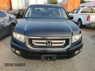 2010 Honda Ridgeline RTL with VIN 5FPYK1F52AB008326, listed as a Copart auction lot 71120074 with 157,688 mi miles and Salvage Title. Bid and sale history available at carsss.com. Image 5.