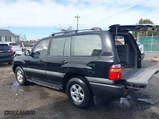 1998 Toyota Land Cruiser with VIN JT3HT05J2W0017214, listed as a IAAI auction lot 41716028 with 214,047 mi miles. Bid and sale history available at carsss.com. Image 3.