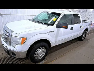 2011 Ford F-150 XL with VIN 1FTFW1EF5BKD48377, listed as a IAAI auction lot 42132364 with 204,145 mi miles. Bid and sale history available at carsss.com. Image 1.