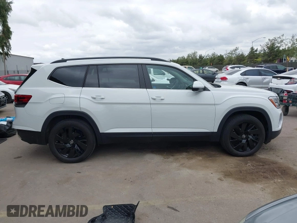 2024 Volkswagen Atlas SE с VIN 1V2WR2CA2RC560161, выставлен на аукционе IAAI как лот 42047000 с пробегом 16 063 миль миль и . История ставок и продаж доступна на DreamBid. Изображение 13.