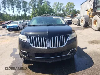 2011 Lincoln MKX z VIN 2LMDJ6JK1BBJ11093, wystawiony jako Copart lot #52635275 z przebiegiem 316 072 mil mil oraz Szkoda całkowita • Salvage title. Historia ofert i sprzedaży dostępna na DreamBid. Obrazek 5.
