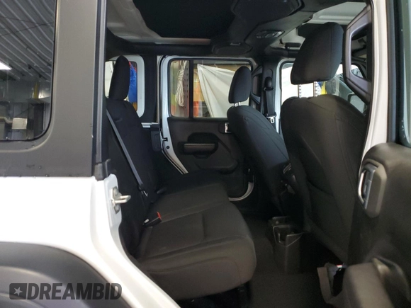 2023 Jeep Wrangler Sport S with VIN 1C4HJXDN1PW628218, listed as a Copart auction lot 48355205 with 32,009 mi miles and Salvage title. Bid and sale history available at DreamBid. Image 11.