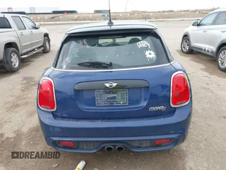 2017 MINI Hardtop 4 Door Cooper S z VIN WMWXU3C3XH2F49313, wystawiony jako IAAI lot #42137594 z przebiegiem 87 865 mil mil oraz . Historia ofert i sprzedaży dostępna na DreamBid. Obrazek 15.