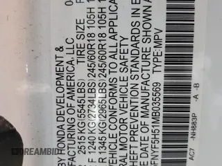 2021 Honda Pilot EX-L z VIN 5FNYF5H51MB035569, wystawiony jako Copart lot #51542935 z przebiegiem 33 281 mil mil oraz Szkoda całkowita • Salvage title. Historia ofert i sprzedaży dostępna na DreamBid. Obrazek 13.