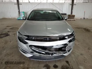 2019 Buick Regal Essence with VIN W04GP6SXXK1049477, listed as a Copart auction lot 59108085 with 97,483 mi miles and Salvage title. Bid and sale history available at DreamBid. Image 5.