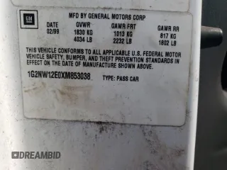 1999 Pontiac Grand Am GT with VIN 1G2NW12E0XM853038, listed as a Copart auction lot 69262194 with 162,986 mi miles and Salvage Title. Bid and sale history available at carsss.com. Image 13.