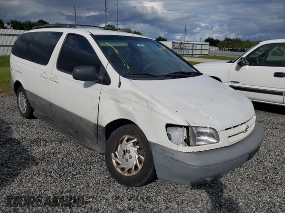 2000 Toyota Sienna CE with VIN 4T3GF19C0YU294779, listed as a Copart auction lot 74715024 with 164,664 mi miles and Salvage Title. Bid and sale history available at carsss.com. Image 4.