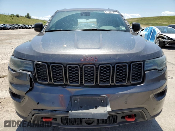 2020 Jeep Grand Cherokee Trailhawk с VIN 1C4RJFLT8LC177606, выставлен на аукционе Copart как лот 61678385 с пробегом 127 421 миль миль и Списание • Salvage title. История ставок и продаж доступна на DreamBid. Изображение 5.