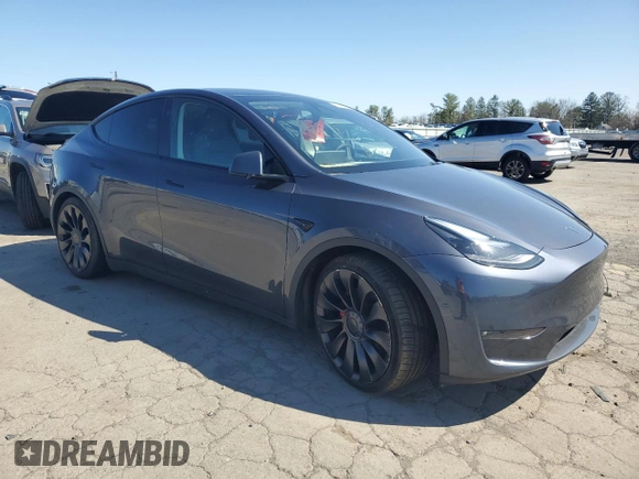 2023 Tesla Model Y Performance z VIN 7SAYGDEF9PF865129, wystawiony jako Copart lot #50228735 z przebiegiem Nie podano mil oraz Szkoda całkowita • Salvage title. Historia ofert i sprzedaży dostępna na DreamBid. Obrazek 4.