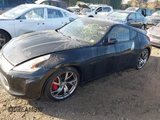 2014 Nissan 370Z with VIN JN1AZ4EH8EM636717, listed as a IAAI auction lot 40751494 with Not Provided miles and . Bid and sale history available at DreamBid. Image 13.