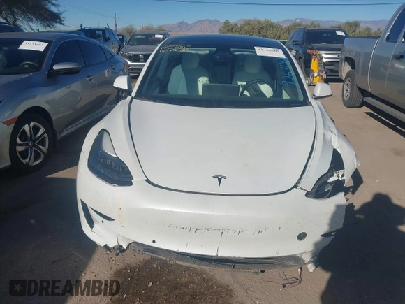 2021 Tesla Model 3 Performance with VIN 5YJ3E1EC6MF926448, listed as a IAAI auction lot 41240309 with 39,386 mi miles and . Bid and sale history available at DreamBid. Image 12.