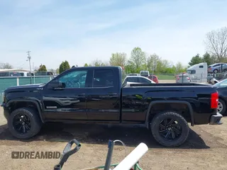 2017 GMC Sierra 1500 SLE z VIN 1GTV2MEC2HZ105964, wystawiony jako IAAI lot #42091941 z przebiegiem 93 779 mil mil oraz . Historia ofert i sprzedaży dostępna na DreamBid. Obrazek 14.