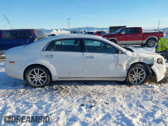 2012 Chevrolet Malibu LTZ with VIN 1G1ZG5E73CF270839, listed as a IAAI auction lot 41284490 with 133,423 mi miles and . Bid and sale history available at DreamBid. Image 13.
