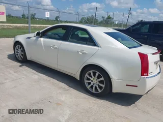 2009 Cadillac CTS AWD z VIN 1G6DS57V690103191, wystawiony jako IAAI lot #42418891 z przebiegiem 151 562 mil mil oraz . Historia ofert i sprzedaży dostępna na DreamBid. Obrazek 3.