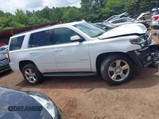 2016 Chevrolet Tahoe LT with VIN 1GNSCBKC9GR459057, listed as a IAAI auction lot 42541097 with 82,203 mi miles and . Bid and sale history available at DreamBid. Image 12.