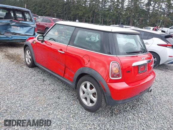 2010 MINI Hardtop with VIN WMWMF3C51ATZ65259, listed as a IAAI auction lot 42248896 with 106,216 mi miles and . Bid and sale history available at DreamBid. Image 3.