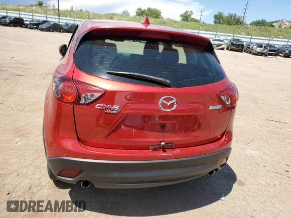 2016 Mazda CX-5 Sport with VIN JM3KE4BYXG0702655, listed as a Copart auction lot 63120205 with 64,403 mi miles and Salvage title. Bid and sale history available at DreamBid. Image 6.