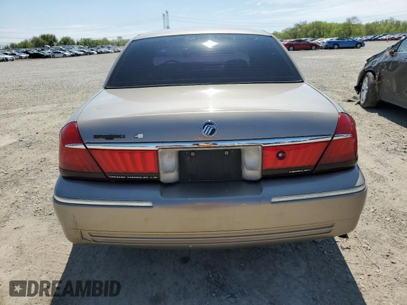2001 Mercury Grand Marquis LS z VIN 2MEFM75W11X612617, wystawiony jako Copart lot #54782295 z przebiegiem 171 944 mil mil oraz Szkoda całkowita • Salvage title. Historia ofert i sprzedaży dostępna na DreamBid. Obrazek 6.