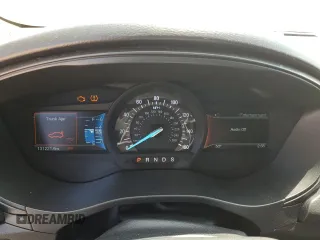 2018 Ford Fusion SE z VIN 3FA6P0HD3JR238137, wystawiony jako Copart lot #54828205 z przebiegiem 131 221 mil mil oraz Szkoda całkowita • Salvage title. Historia ofert i sprzedaży dostępna na DreamBid. Obrazek 9.