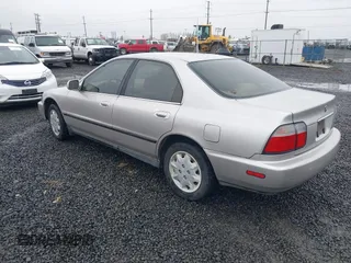 1997 Honda Accord LX with VIN 1HGCD5636VA237594, listed as a IAAI auction lot 41802597 with 215,782 mi miles and . Bid and sale history available at carsss.com. Image 3.