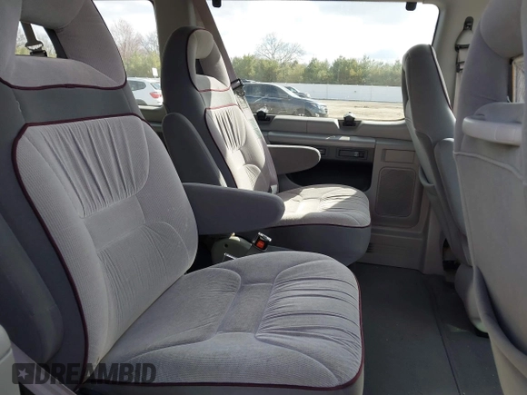 1999 Ford Econoline Passenger XL with VIN 1FMRE11L1XHA05657, listed as a IAAI auction lot 41968923 with 150,868 mi miles and . Bid and sale history available at carsss.com. Image 8.