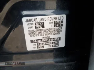 2014 Jaguar XJ Portfolio z VIN SAJWA2GZ2E8V64993, wystawiony jako Copart lot #88774965 z przebiegiem Nie podano mil oraz Szkoda całkowita • Salvage title. Historia ofert i sprzedaży dostępna na DreamBid. Obrazek 12.