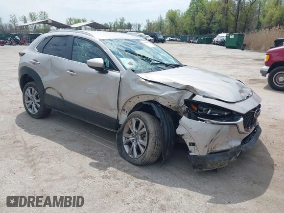 2022 Mazda CX-30 S Select z VIN 3MVDMBBL2NM439681, wystawiony jako IAAI lot #41960902 z przebiegiem 22 730 mil mil oraz . Historia ofert i sprzedaży dostępna na DreamBid. Obrazek 1.