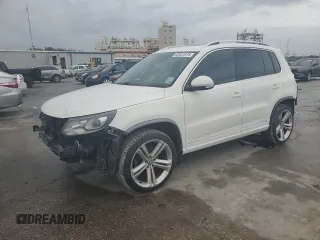 2014 Volkswagen Tiguan SE z VIN WVGAV3AX9EW013493, wystawiony jako Copart lot #83451974 z przebiegiem 105 313 mil mil oraz Szkoda całkowita • Salvage title. Historia ofert i sprzedaży dostępna na DreamBid. Obrazek 1.