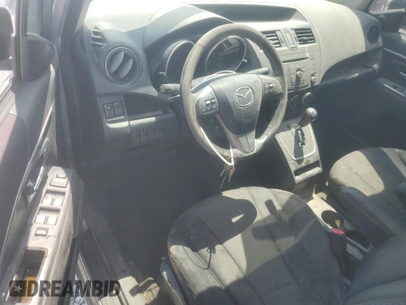 2012 Mazda 5 Touring with VIN JM1CW2CL5C0141969, listed as a Copart auction lot 62771735 with Not provided miles and Salvage title. Bid and sale history available at DreamBid. Image 8.