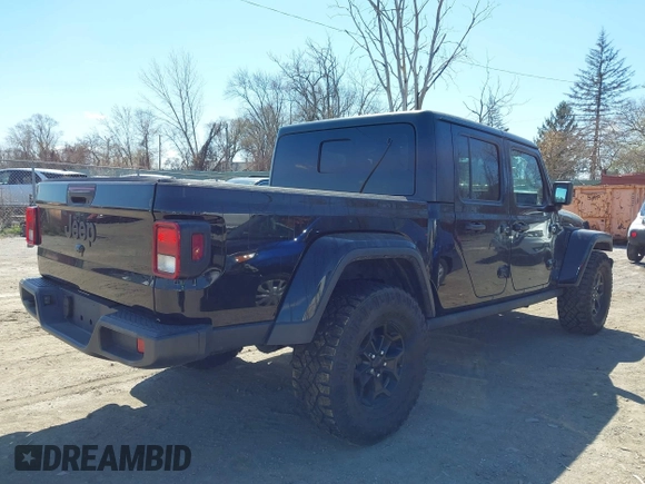 2022 Jeep Gladiator Texas Trail with VIN 1C6HJTAG2NL120506, listed as a IAAI auction lot 42048215 with 65,048 mi miles. Bid and sale history available at carsss.com. Image 4.