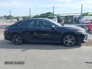 2019 Toyota Camry LE z VIN 4T1B11HK2KU281694, wystawiony jako IAAI lot #42289169 z przebiegiem 111 058 mil mil oraz . Historia ofert i sprzedaży dostępna na DreamBid. Obrazek 13.