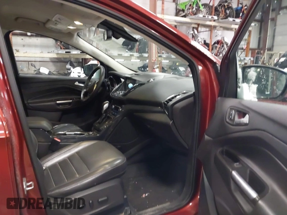 2016 Ford Escape Titanium with VIN 1FMCU9JX6GUB57497, listed as a IAAI auction lot 41375019 with 1 mi miles. Bid and sale history available at carsss.com. Image 5.