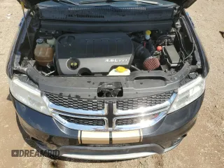 2013 Dodge Journey SXT with VIN 3C4PDCBG9DT619557, listed as a Copart auction lot 61551545 with 159,950 mi miles and Salvage title. Bid and sale history available at DreamBid. Image 11.